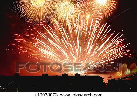 Stock Image - Fireworks exploding in sky, long exposure. Fotosearch