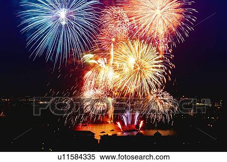 Fireworks exploding in sky, long exposure View Large Photo Image Stock Photography - Fireworks exploding in sky, long exposure. Fotosearch