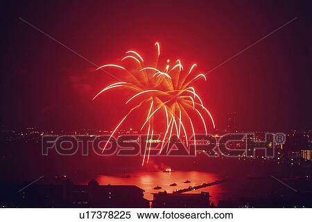 Fireworks exploding in sky, long exposure View Large Photo Image Stock Photography - Fireworks exploding in sky, long exposure. Fotosearch