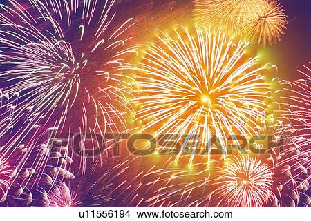 Fireworks exploding in sky, low angle view, long exposure View Large Photo Image Picture - Fireworks exploding in sky, low angle view, long exposure. Fotosearch