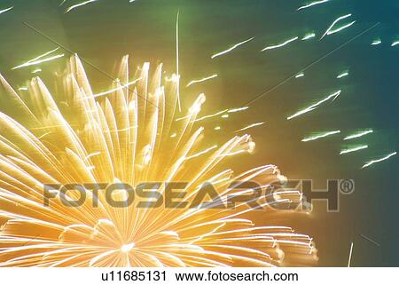 Fireworks exploding in sky, low angle view, soft focus, long exposure View Large Photo Image Stock Image - Fireworks exploding in sky, low angle view, soft focus, long exposure. Fotosearch