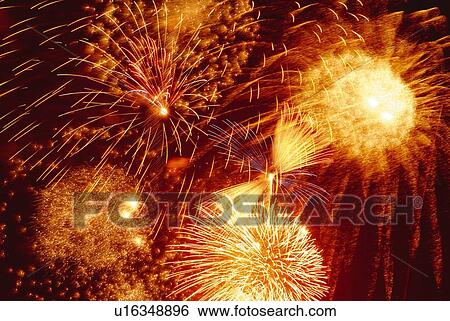 Fireworks exploding in sky, low angle view, long exposure View Large Photo Image Stock Photograph - Fireworks exploding in sky, low angle view, long exposure. Fotosearch