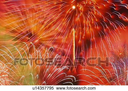 Fireworks exploding in sky, low angle view, long exposure View Large Photo Image Stock Photography - Fireworks exploding in sky, low angle view, long exposure. Fotosearch