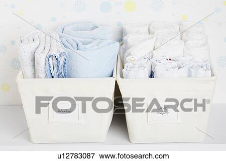 Towels and cloth diapers in baskets View Large Photo Image Stock Photo - Towels and cloth diapers in baskets. Fotosearch