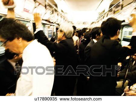 Stock Photography - Blurred, Bullet Train, Casual Clothing, Large Group Of People, Day. Fotosearch
