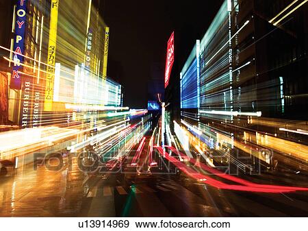 Stock Photo - Building, City, Dark, Glowing, Illuminated. Fotosearch
