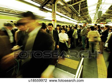 Stock Image - Commuter, Crowded, Day, Formal Clothing. Fotosearch
