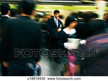 Stock Photography - Commuter, Large Group Of People, Day, Formal Clothing. Fotosearch