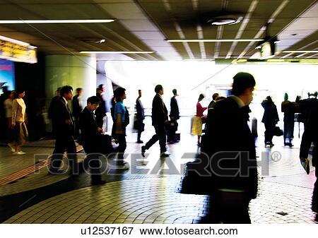 Stock Photo - Walking, Formal Clothing, Blurred. Fotosearch