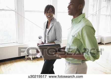 Stock Photo - Architects planning in room. Fotosearch