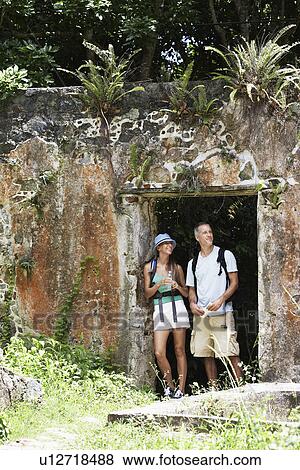 Mid adult couple at ruin, St. John, US Virgin Islands, USA View Large Photo Image Stock Photo - Mid adult couple at ruin, St. John, US Virgin Islands, USA. Fotosearch