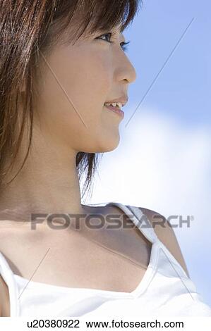 Young woman on beach, smiling, Saipan, USA View Large Photo Image Stock Image - Young woman on beach, smiling, Saipan, USA . Fotosearch
