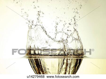 Stock Photo - close-up, disturbance, droplets. Fotosearch