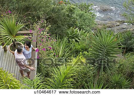 Middle Aged Couple at Cottage View Large Photo Image Stock Photo - Middle Aged Couple at Cottage. Fotosearch