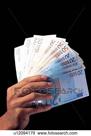 Stock Photo - Black Background, Close-Up, Group Of Objects, One Person. Fotosearch