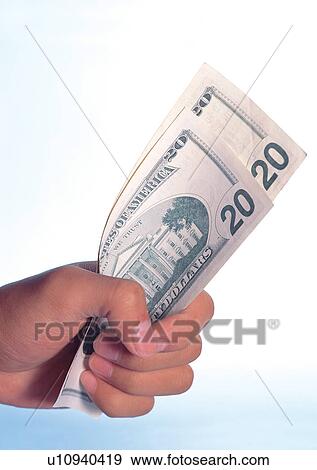 Stock Photo - Close-Up, One Person, Two Objects. Fotosearch