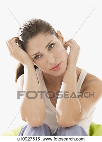 Young woman in tank top (portrait) View Large Photo Image Stock Photography - Young woman in tank top (portrait). Fotosearch