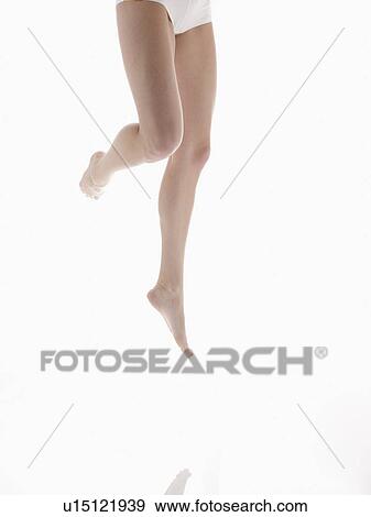 Young woman's bare legs (low section) View Large Photo Image Stock Photo - Young woman's bare legs (low section). Fotosearch