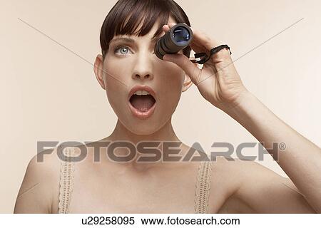 Mid adult woman using monocular View Large Photo Image Stock Photography - Mid adult woman using monocular. Fotosearch