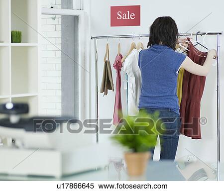 Young Woman in Sales View Large Photo Image Stock Photography - Young Woman in Sales. Fotosearch