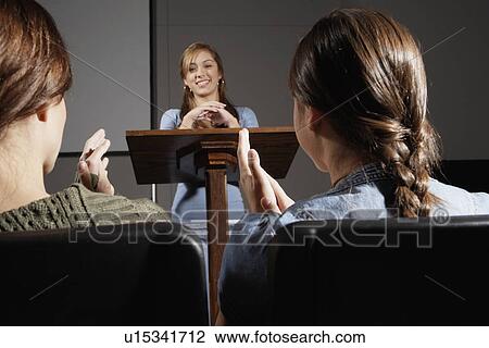 Students clapping at female lecturer View Large Photo Image Stock Image - Students clapping at female lecturer. Fotosearch