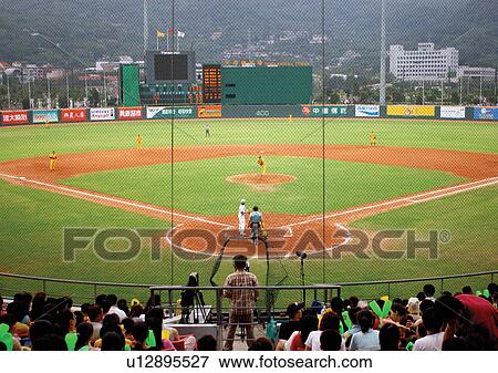 Stock Photo - advertisements, challenge, baseball, adults. Fotosearch