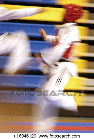 Stock Image - challenge, competing, competence, adults. Fotosearch