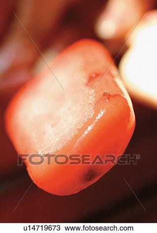 Stock Image - Indoor, One Person, Ice Candy. Fotosearch