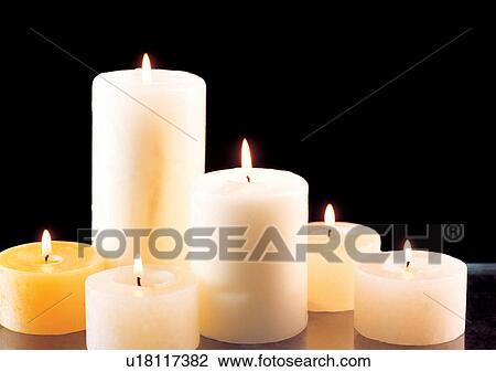 Stock Image - Black Background, Burning, Candle, Candlelight, Flame. Fotosearch