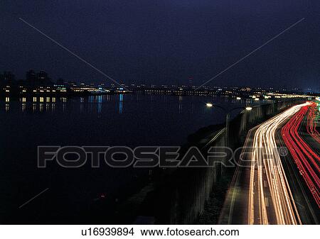 Picture - Blurred Motion, Building Exterior, City, Commute, Darkness. Fotosearch