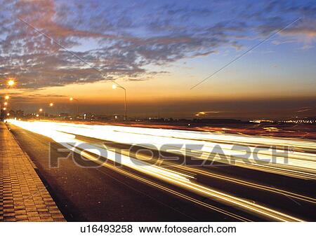 Blurred Motion, Clouds, Headlight, Horizon View Large Photo Image Stock Photo - Blurred Motion, Clouds, Headlight, Horizon. Fotosearch