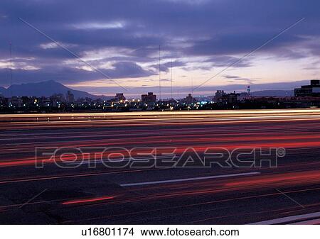 Hills, Homes, Night, Urban Scene, Blurred Motion, Clouds View Large Photo Image Picture - Hills, Homes, Night, Urban Scene, Blurred Motion, Clouds. Fotosearch