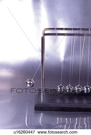 Part Of, Ball, Blurred Motion, Desk Toy View Large Photo Image Stock Photo - Part Of, Ball, Blurred Motion, Desk Toy. Fotosearch