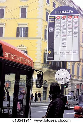 Stock Image - Building Exterior, Bus, Car, Day, Medium Group Of People, Outdoor. Fotosearch