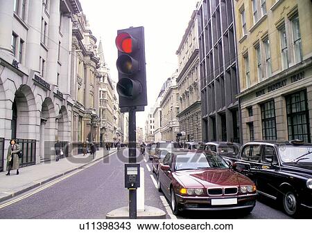 Stock Image - Building Exterior, Car, Crowded, Day. Fotosearch