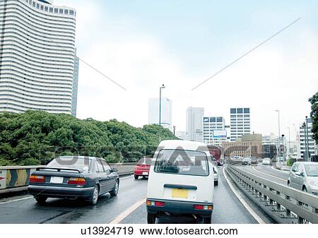 Buildings, Day, Clouds, Car, Arrow View Large Photo Image Stock Photo - Buildings, Day, Clouds, Car, Arrow. Fotosearch