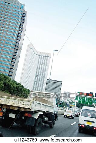 Stock Photo - Buildings, Mode Of Transport, Day, Car, Arrows. Fotosearch