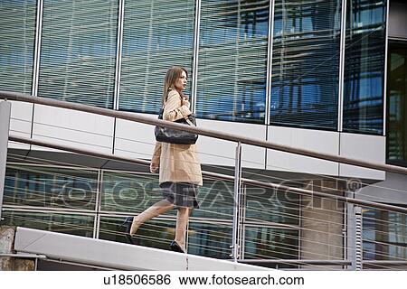 Stock Photograph - Businesswoman Walking on Ramp. Fotosearch