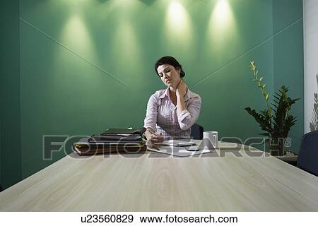 Businesswoman working late View Large Photo Image Stock Photo - Businesswoman working late. Fotosearch