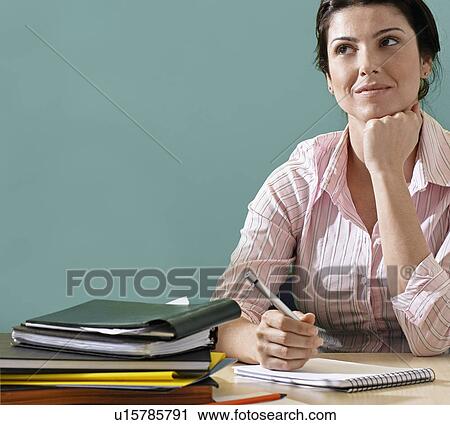 Stock Image - Two Women Working. Fotosearch