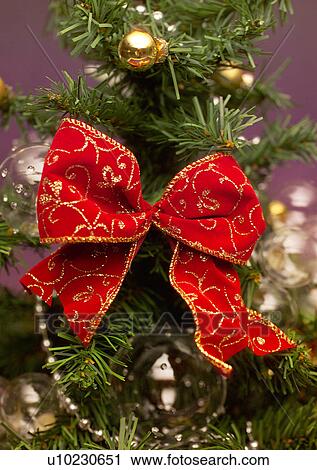 Stock Image - Christmas Décor, Celebrations, Décor, Bow, Christmas, Christmas Decoration, Christmas Ornament. Fotosearch