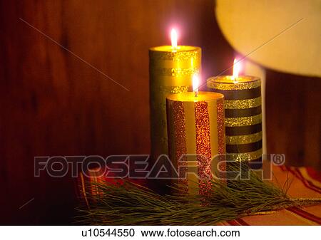 Stock Image - Christmas Décor, Celebrations, Décor, Burning, Candle, Christmas, Christmas Decoration. Fotosearch