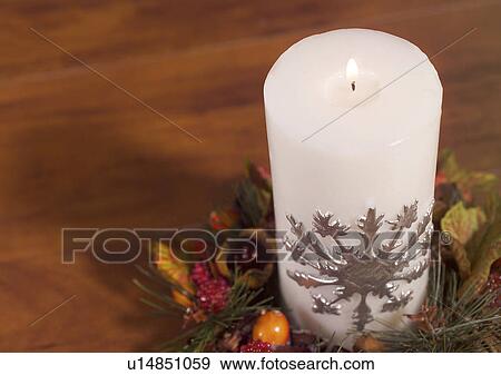 Christmas Décor, Celebrations, Décor, Burning, Candle, Christmas, Christmas Decoration View Large Photo Image Stock Photo - Christmas Décor, Celebrations, Décor, Burning, Candle, Christmas, Christmas Decoration. Fotosearch