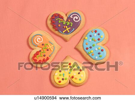 Love Tokens, Backgrounds, Close-Up, Colored Background, Cookie View Large Photo Image Picture - Love Tokens, Backgrounds, Close-Up, Colored Background, Cookie. Fotosearch