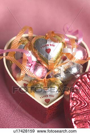 Stock Photo - Love Tokens, Candy, Close-Up, Colored Background. Fotosearch