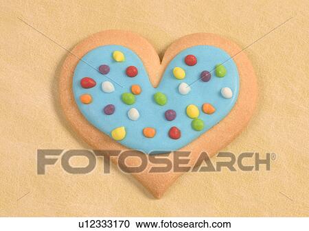 Stock Image - Love Tokens, Close-Up, Colored Background, Cookie, Decoration. Fotosearch