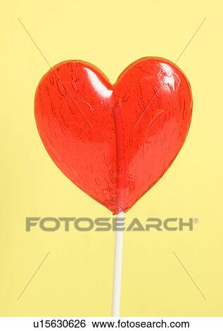 Stock Photograph - Love Tokens, Close-Up, Colored Background, Heart Shape, Indoor. Fotosearch