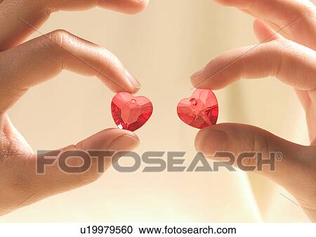 Love Tokens, Close-Up, Diamond, Heart Shape, Holding View Large Photo Image Stock Image - Love Tokens, Close-Up, Diamond, Heart Shape, Holding. Fotosearch