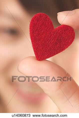 Love Tokens, Close-Up, Focus On Foreground, Heart Shape, Holding View Large Photo Image Stock Image - Love Tokens, Close-Up, Focus On Foreground, Heart Shape, Holding. Fotosearch