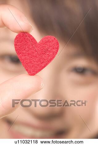 Love Tokens, Close-Up, Focus On Foreground, Holding View Large Photo Image Stock Photo - Love Tokens, Close-Up, Focus On Foreground, Holding. Fotosearch